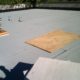 finished commercial flat roof being prept for patio stones walkways.
